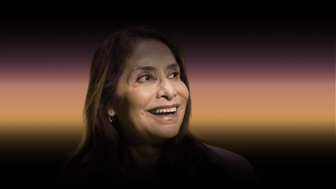 Lupe Martinez Izzo smiling during a Michigan State University community event